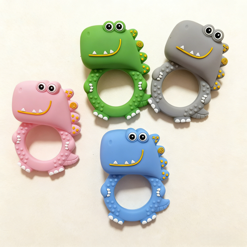 dinosaur baby teething rattle toy made of food grade silicone, safe for chewing, easy grip design, suitable for babies 3 months+